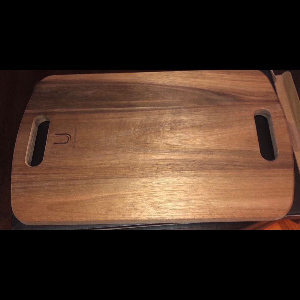 DONATED TO CHARITY NIB Cutting board Uncommon James